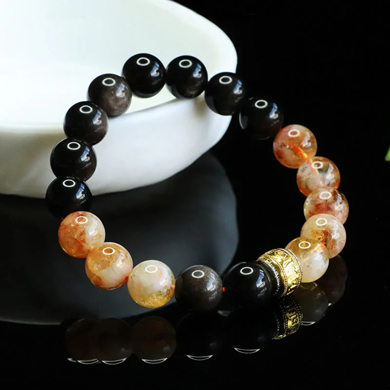 Bransoletka ochronna z Buddha Stones Om Mani Padme Hum w srebrnym połysku z obsydianem i cytrynem