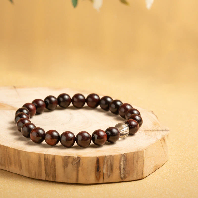 Bransoletka ochronna z małych liści z czerwonego drzewa sandałowego i białego kryształu z Buddha Stones