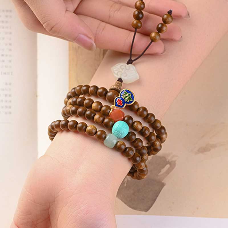 Bransoletka ochronna z palisandru tybetańskiego z Buddha Stones Mala - Image 7