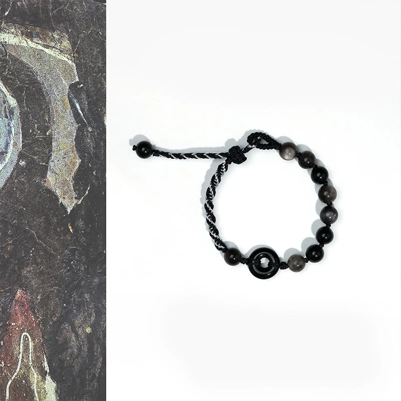 Bransoletka z czarnej liny z zapięciem pokojowym i naturalnym czarnym obsydianem z Buddha Stones