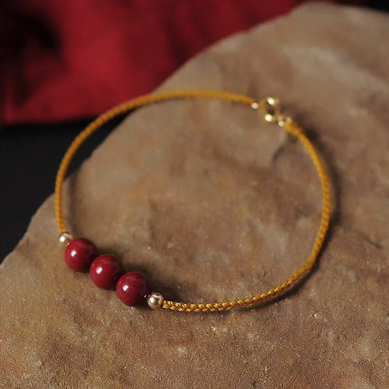 Bransoletka z naturalnego sznurka błogosławieństwa z Buddha Stones 14K pozłacana cynobrem - Image 2