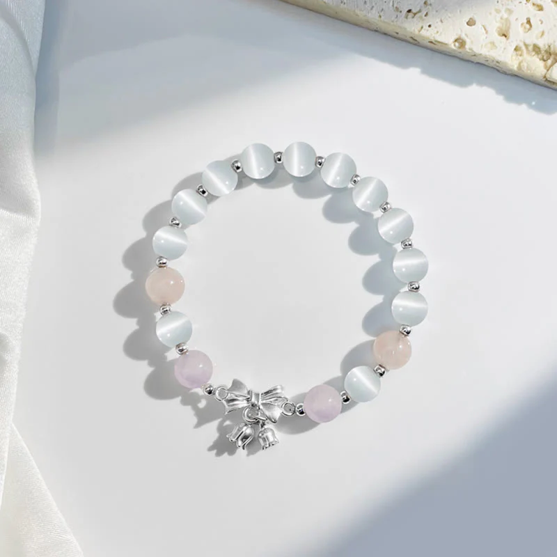 Bransoletka z zawieszką w kształcie rozety z Buddha Stones , kociego oka i lawendowego ametystu