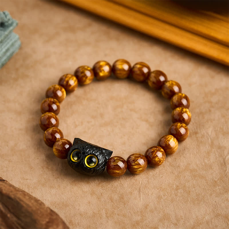 Buddha Stones Bransoletka z kotem i koralikami z żywicy hebanowej w kolorze żółtym