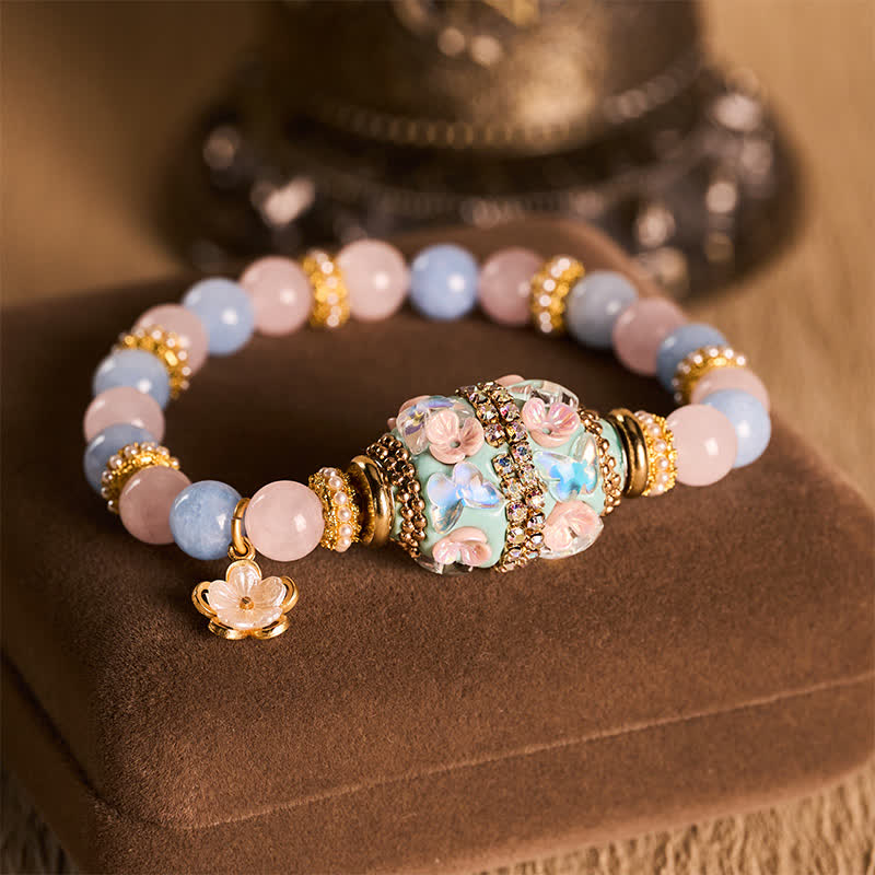 Buddha Stones Bransoletka z okrągłymi koralikami w kształcie kwiatu z różowego kwarcu, niebieskiego chalcedonu i miedzi