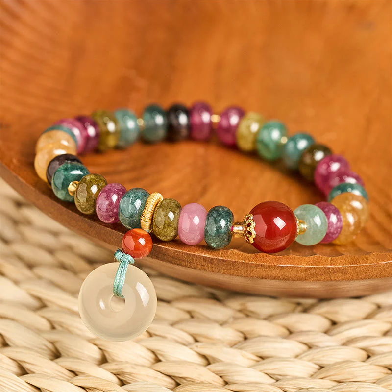 Buddha Stones Bransoletka z turmalinem i chalcedonem z zapięciem w kształcie symbolu pokoju i miłości.