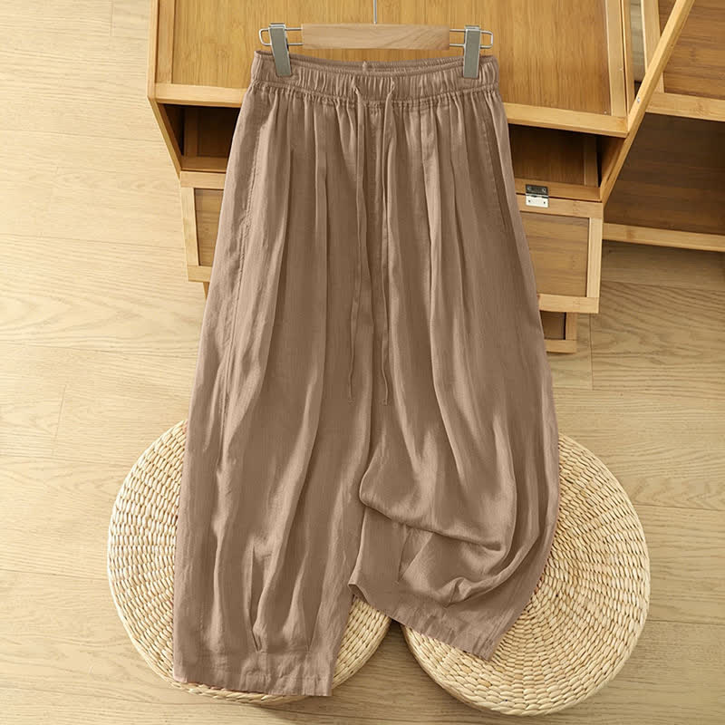 Buddha Stones Letnie, swobodne spodnie capri w stylu boho ze ściągaczem i kieszeniami. Szerokie nogawki.