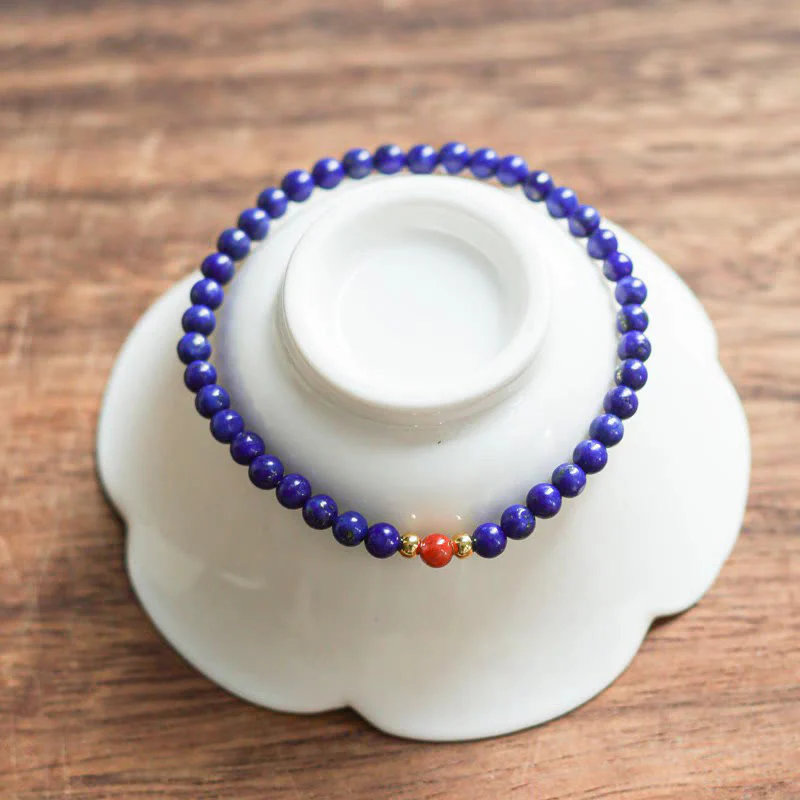 Bransoletka z Buddha Stones, małych lazurytów, lapis lazuli, cynobru, ultracienkich koralików