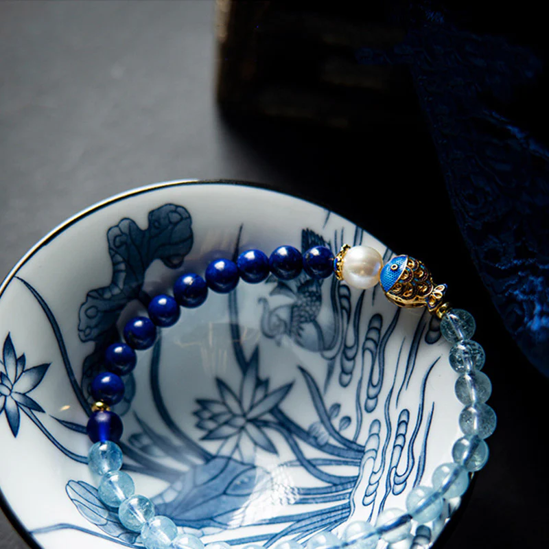 Bransoletka lecznicza z Buddha Stones, naturalnym akwamarynem i lazurytem, lapis lazuli, z motywem ryb - Image 4