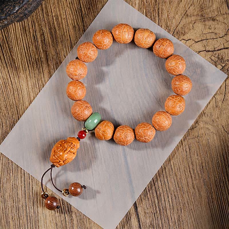 Buddha Stones Ręcznie rzeźbiona etniczna mala na nadgarstek z motywem mądrości Bodhi i oka feniksa