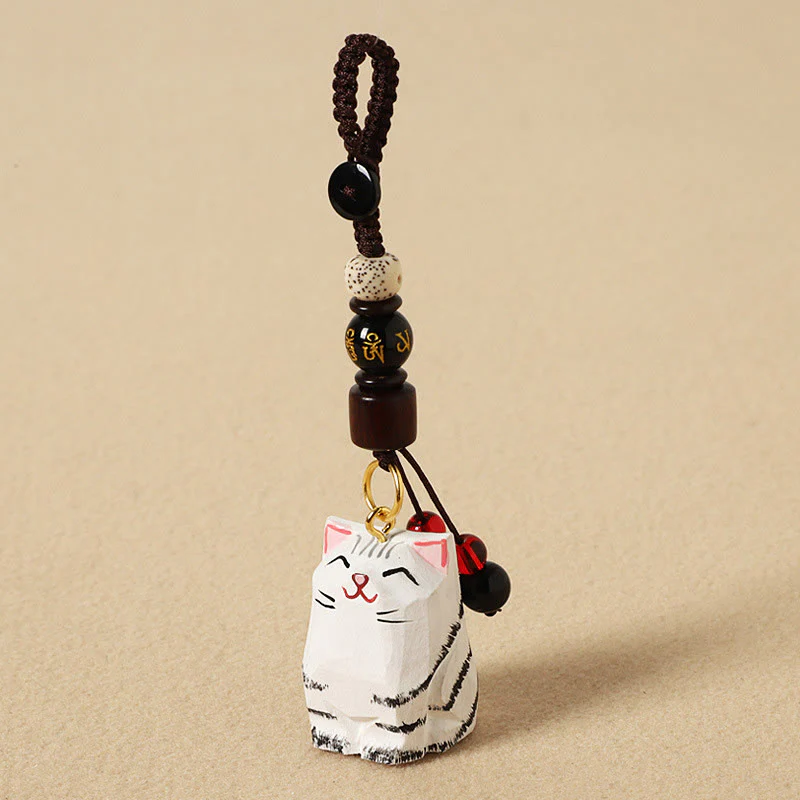 Buddha Stones Ręcznie rzeźbione drewniane breloki do kluczy z motywem pokoju „Om Mani Padme Hum” - Image 15